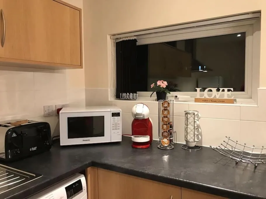 Image 1 of Comfortable 3-Storey House with Free Car Parking