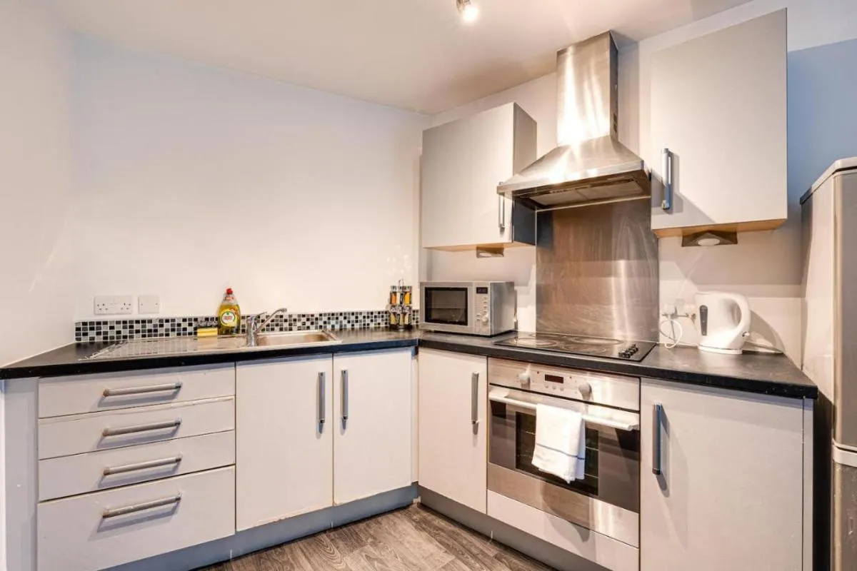 Image 1 of 2 Bed apartment with balcony private parking near Etihad Stadium, COOP Live